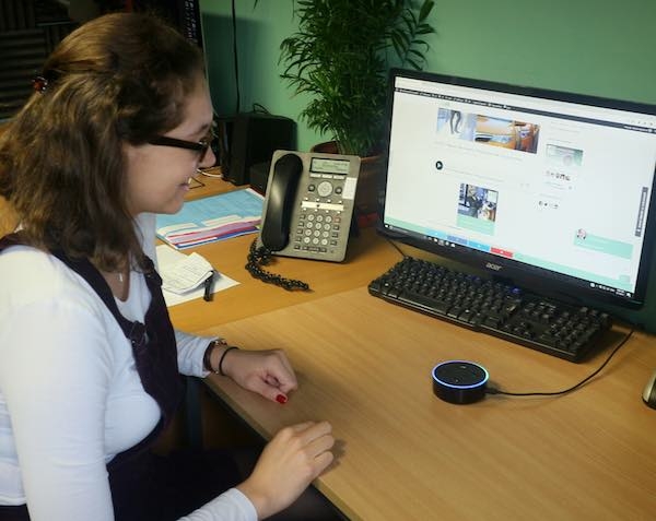 Informed Choice team member Alice Cranwell testing the new Alexa Flash Briefing sysem