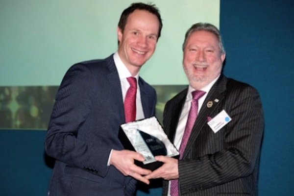 Stuart Robinson (left) receives his award