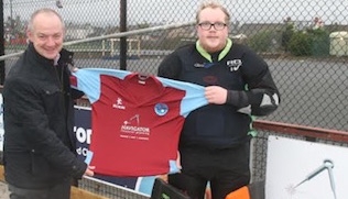 David Crozier CFPCM, left, with Lindsay Beck, captain of Kilkeel Hockey Club's 2nd XI