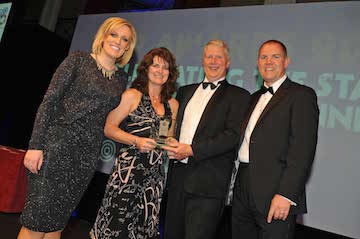 Paula Hodge of Old Mill Financial Planning received her award in 2014 from TV's Steph McGovern plus the IFP's Nick Cann (second right) and Steve Gazzard at IFP annual conference 2014