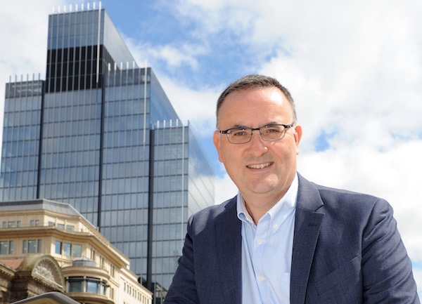 Stephen Drew in front of 103 Colmore Row