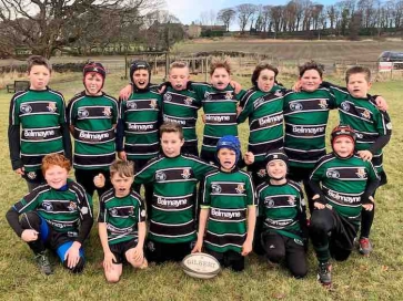 Wortley RUFC players in their Belmayne-sponsored strip