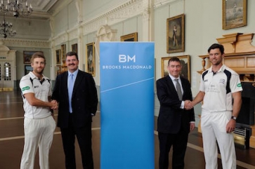 CEO, Chris Macdonald (left) and Deputy CEO, Andrew Shepherd (right) with Middlesex’s T20 captain Dawid Malan (left) and One-Day captain James Franklin (right). Brooks Macdonald has been the main sponsor since 2012.