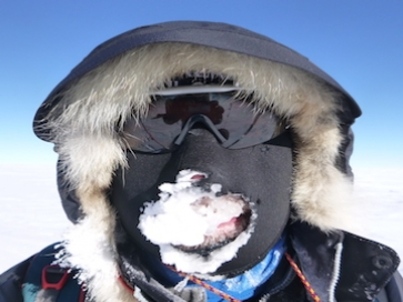 Patrick McIntosh covered in ice during his trek