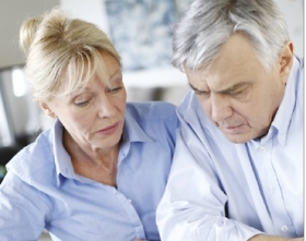 Worried-looking retired people