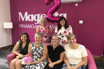 The team celebrate Magenta&#039;s two-year anniversary